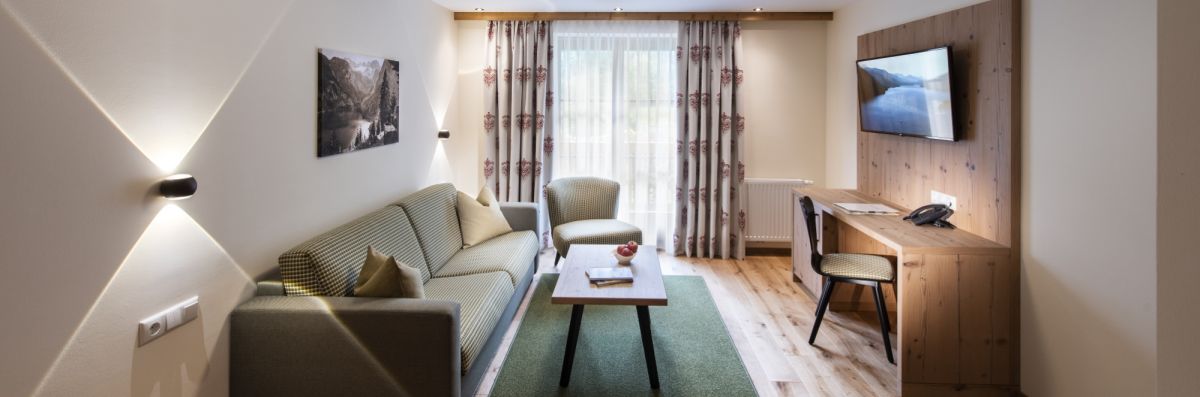 Machen Sie es sich in unseren Zimmern und Appartements gemütlich